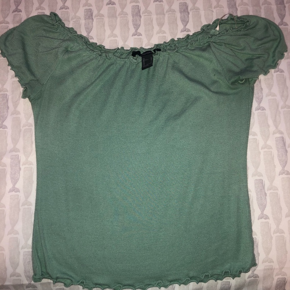 Frilly green top